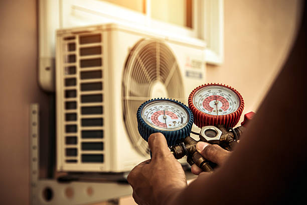 Professional Hvac technician working in Ortonville, MI